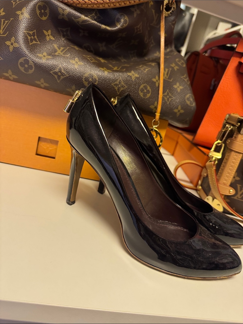 Louis Vuitton Black Patent Leather Stiletto Pumps with Gold Padlock Detail - Picture 2 of 4